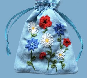 Hand sewn blue mini-bag with flowers - by Sew Fab
